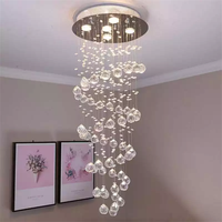 Lampe suspendue pour hôtel, restaurant, escalier, villa, moderne, luxueuse, blanc chaud, en forme de goutte de pluie, longue spirale, chaîne de cristal K9