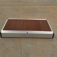 Nouveau coussin de refroidissement évaporatif haute efficacité en papier kraft refroidi par eau XIANGHUA pour l'apiculture, les serres et les fermes avicoles
