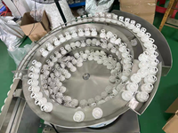 Machine automatique de comptage et de remplissage de tubes de comprimés effervescents de type rotatif