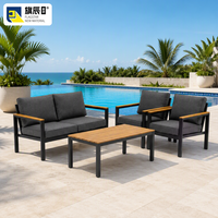 Ensemble de meubles de patio extérieur 4 pièces, structure en métal noir, plateau en bois, canapé deux places, 2 fauteuils, table basse, jardin