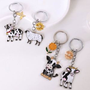 Nouveau Porte-clés en métal motif Vache Fleur de dessin animé, Chaîne de téléphone mignonne, Pendentif de sac, Décoration animale personnalisable - Product Image 1