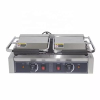 Grande plaque de cuisson électrique double face 4,4 kW avec plaques supérieure et inférieure à interrupteurs indépendants, robuste pour usage commercial