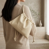 Pochette à cordon en cuir PU grainé crème, sac de rangement pour bijoux et cadeaux, organisateur de voyage pour cosmétiques, emballage personnalisé avec logo, vente en gros