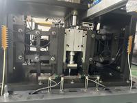 Machine de soufflage par injection automatique à 9 cavités pour bouteilles PET, moteur Delta PLC, haute productivité pour l'eau minérale