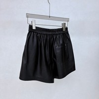 Shorts en cuir noir décontractés pour femme, respirants et imperméables, taille mi-haute élastique, avec boutons-pression latéraux – Collection Chic de notre Outlet d'usine