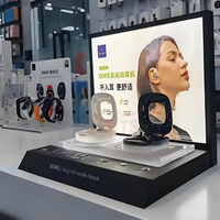 Présentoir acrylique personnalisé du fabricant pour écouteurs Bluetooth avec présentoir d'accessoires d'écouteurs de sport à LED numériques.