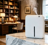 Diffuseur d'huiles essentielles sans eau Bluetooth à double fluide avec ventilateur puissant intégré pour une diffusion rapide des parfums et une portabilité accrue.