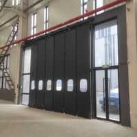 Panneau sandwich en acier automatique industriel de grande envergure Porte pliante horizontale à isolation thermique Porte de sécurité électrique