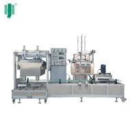 Remplisseuse pneumatique semi-automatique GWJ01-20 avec bouchonneuse pour bouteilles métalliques/plastiques, jus et produits chimiques, longue durée de vie