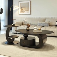Table basse créative de style crème, ovale, pour salon, petite unité domestique, style italien minimaliste avec rangement