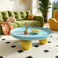 Table basse ronde de style coloré et joyeux, avec pieds créatifs en forme de boule, mobilier moderne et coloré pour salon, table basse pour la maison
