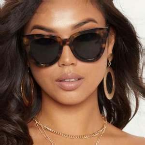 Lunettes de soleil œil de chat pour femmes, monture léopard noire, logo personnalisé, protection UV400, nouvelle collection 2025, vente chaude - Product Image 1