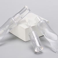 OMI Nouveau Style Plumper 6ml Tubes de brillant à lèvres en plastique transparent Twist up Forme de compression spéciale Conteneur de brillant à lèvres personnalisé