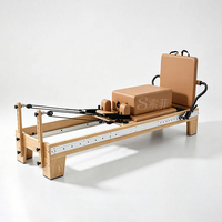 Machine de Pilates Reformer en chêne nord-américain, équipement de yoga pour la maison et le studio, avec lit à rail complet pour l'entraînement en studio