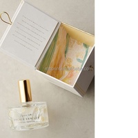 Boîte de parfum magnétique en papier de carton d'emballage de cadeau de parfum de luxe à rabat magnétique de conception personnalisée