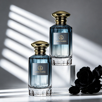 Flacon de parfum en verre transparent cylindrique de luxe, logo personnalisé, bouchon personnalisé et emballage personnalisé, rechargeable, unisexe