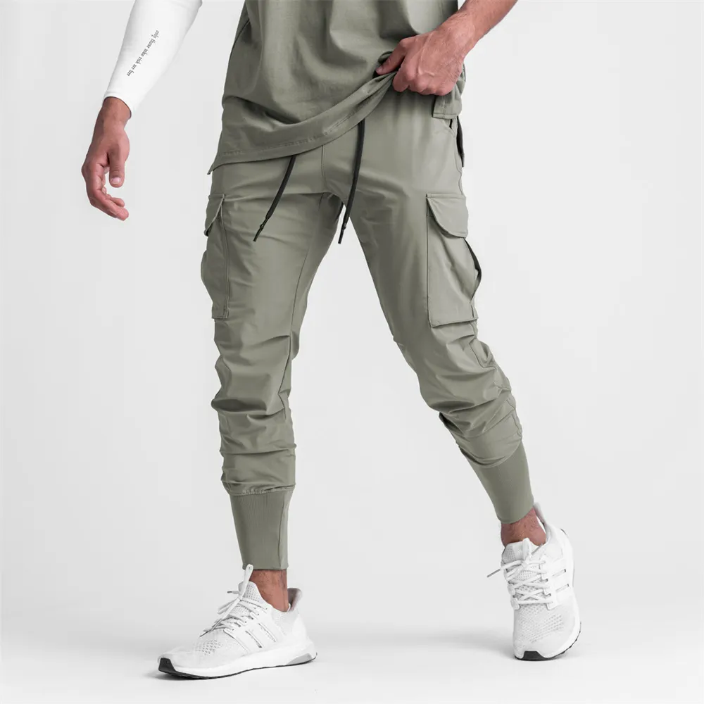 High Quality Custom Logo Slim Fit Sports Athletic Blank Cargo Fitness Casual Nylon Men Joggers Pants With Zipper Pockets