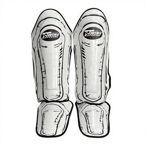 Nouvelle conception, protège-tibias de boxe en cuir personnalisé à double couche, réglable, protection professionnelle pour l'entraînement au kickboxing, arts martiaux - Product Image 1