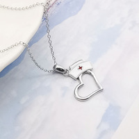 Vente en gros de bijoux tendances Pendentif en forme de cœur en argent sterling 925 avec chaîne câblée Collier pour femmes Cadeau personnalisé
