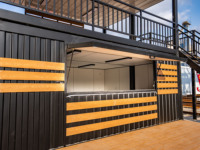 Café préfabriqué en conteneur pour rue |   Café modulaire antirouille |   Maison de vente au détail moderne au design vibrant orange, prête à l'emploi