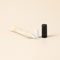 Tube souple vide personnalisé pour brillant à lèvres avec embout applicateur en silicone et capuchon noir – Emballage cosmétique pour baume à lèvres
