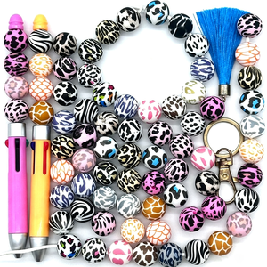 En stock: Cuentas sueltas redondas de silicona de 19 mm con estampado de transferencia de agua de colores para pulseras de dentición de bebé DIY y suministros de manualidades. - Product Image 1