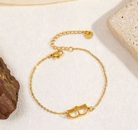 Bracelet transfrontalier en acier inoxydable avec pendentif livre creux, accessoire de luxe polyvalent et de niche