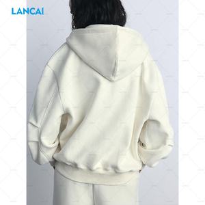 Sudadera con capucha y cremallera completa en blanco de rizo de algodón para mujer de alta calidad personalizada y pantalones de chándal holgados a juego Beige conjunto de 2 piezas para mujer - Product Image 3