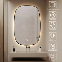 Miroir de salle de bain LED rectangulaire incurvé encadré, avec éclairage à intensité variable et fonction anti-buée