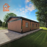 Maison conteneur préfabriquée démontable à panneaux sandwich, à toit en pente, en kit, pour salle de classe d'urgence et école primaire
