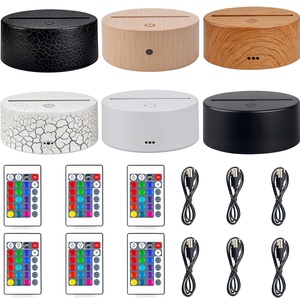 Lampada da Tavolo LED Creativa con Telecomando, 16 Colori Dimmerabili, Alimentazione USB, Base per Luce Notturna con Illusione Ottica 3D - Product Image 1