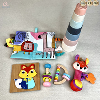 Ensemble cadeau Montessori éducatif sensoriel en bois et silicone écologique pour bébés - Hochet, livre en tissu, jouet à empiler, puzzle d'animaux