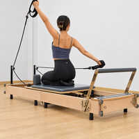 Machine de Pilates pliable en bois massif avec ressorts pour studio de gym et rééducation physique