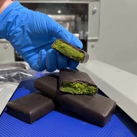 Ligne de production de barres énergétiques en chocolat entièrement automatique Machine d'enrobage de chocolat Tunnel de refroidissement Machine d'enrobage de chocolat