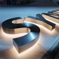 Enseigne extérieure rétroéclairée 3D personnalisée en acier inoxydable et lettres LED en acrylique pour devanture de magasin