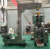 Machine d'emballage VFFS intégrée automatique à 10/14 têtes de pesage pour biscuits, chips, snacks et aliments, machine d'emballage 2 en 1