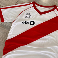 Fournisseur de maillots de football sportifs imprimés en polyester 100% surdimensionnés en tricot Dryfit pour hommes personnalisés