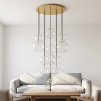 Lustre moderne en acier inoxydable avec globe en verre transparent pour salon, escalier, hôtel, décoration