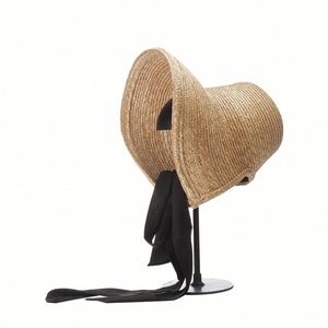 Chapeau de soleil élégant et luxueux Laurie pour femme, nouveau chapeau d'été en paille de blé, chapeau de plage pour vacances en bord de mer avec ruban à nouer - Product Image 2