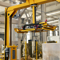 Machine d'emballage de palettes de type bras rotatif pour ligne d'emballage de boissons et de bouteilles en plastique, machine d'emballage de palettes à film étirable