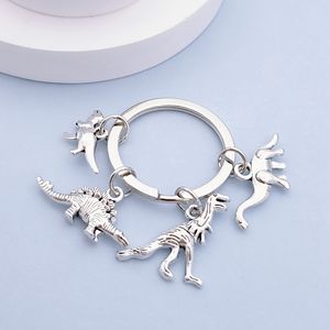 Llavero de Dinosaurio de Aleación de Zinc, Lindo Juego de <span class=keywords><strong>4</strong></span> Mini Dijes de Dinosaurio, Llavero de Moda con Animales para Bolsos, Carteras y Accesorios para Llaves de Coche - Product Image 1