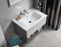 Meubles-lavabos flottants de luxe de style italien moderne à motif marbre gris et blanc pour projet de salle de bain principale de villa