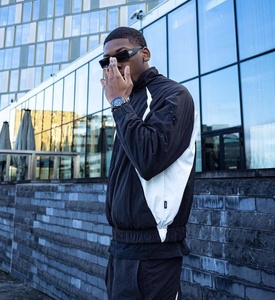 Tute Sportive da Uomo <span class=keywords><strong>in</strong></span> Poliestere Patchwork con Giacca e Pantaloni <span class=keywords><strong>in</strong></span> Nylon con Zip Set da Jogging per Palestra Tuta Personalizzata Unisex OEM <span class=keywords><strong>in</strong></span> Nylon - Product Image 4