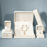 Boîte de rangement pour bijoux en cuir PU et velours, design personnalisé, pour bagues et colliers
