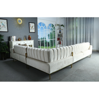 Canapé d'angle en L moderne de luxe en tissu velours écologique et durable, rembourré, avec piètement en acier inoxydable pour salon - Vente en gros usine