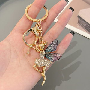 Porte-clés de luxe en alliage de zinc avec ailes de cristal, en forme de danseuse féerique - Product Image 4