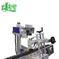 Machine de marquage laser automatique de haute précision avec module de positionnement rotatif à rouleaux pour la gravure laser sur bouteilles en verre rondes