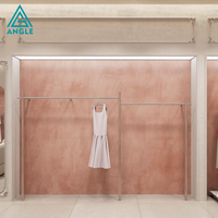 Système de présentoirs modulaires en métal professionnels personnalisés pour magasins de vêtements, aménagements de boutiques de détail, design intérieur pour vêtements de sport