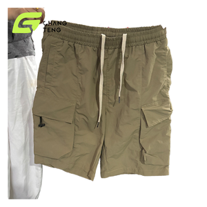 Shorts cargo de couleur unie pour hommes, avec taille élastique et plusieurs poches, en polyester et coton, respirant, multi-poches, vêtements d'été - Product Image 1