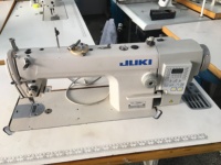 Jukis 8700 d'occasion Machine à coudre droite informatisée à une aiguille 8700B-7 Machine à coudre à point noué à entraînement direct